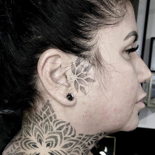 Facetatt gezichtstatoeage dotwork