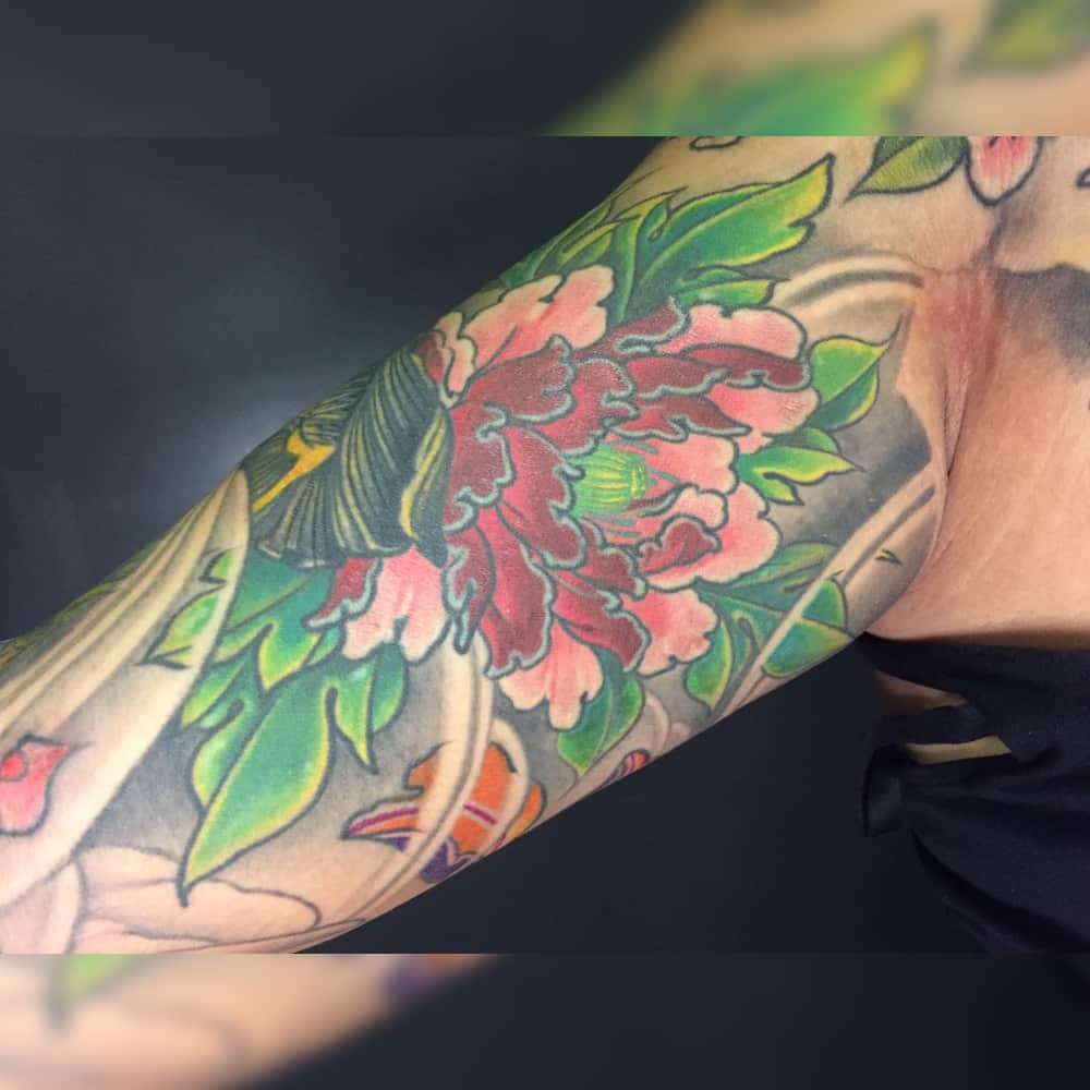 Japanse kleuren tattoo sleeve met lotus
