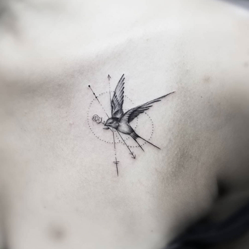 Fineline vogel met roos tattoo Fernando