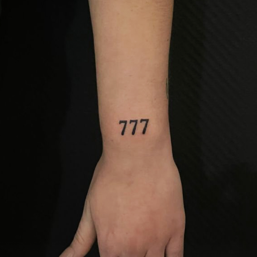 777 angel numbers tattoo